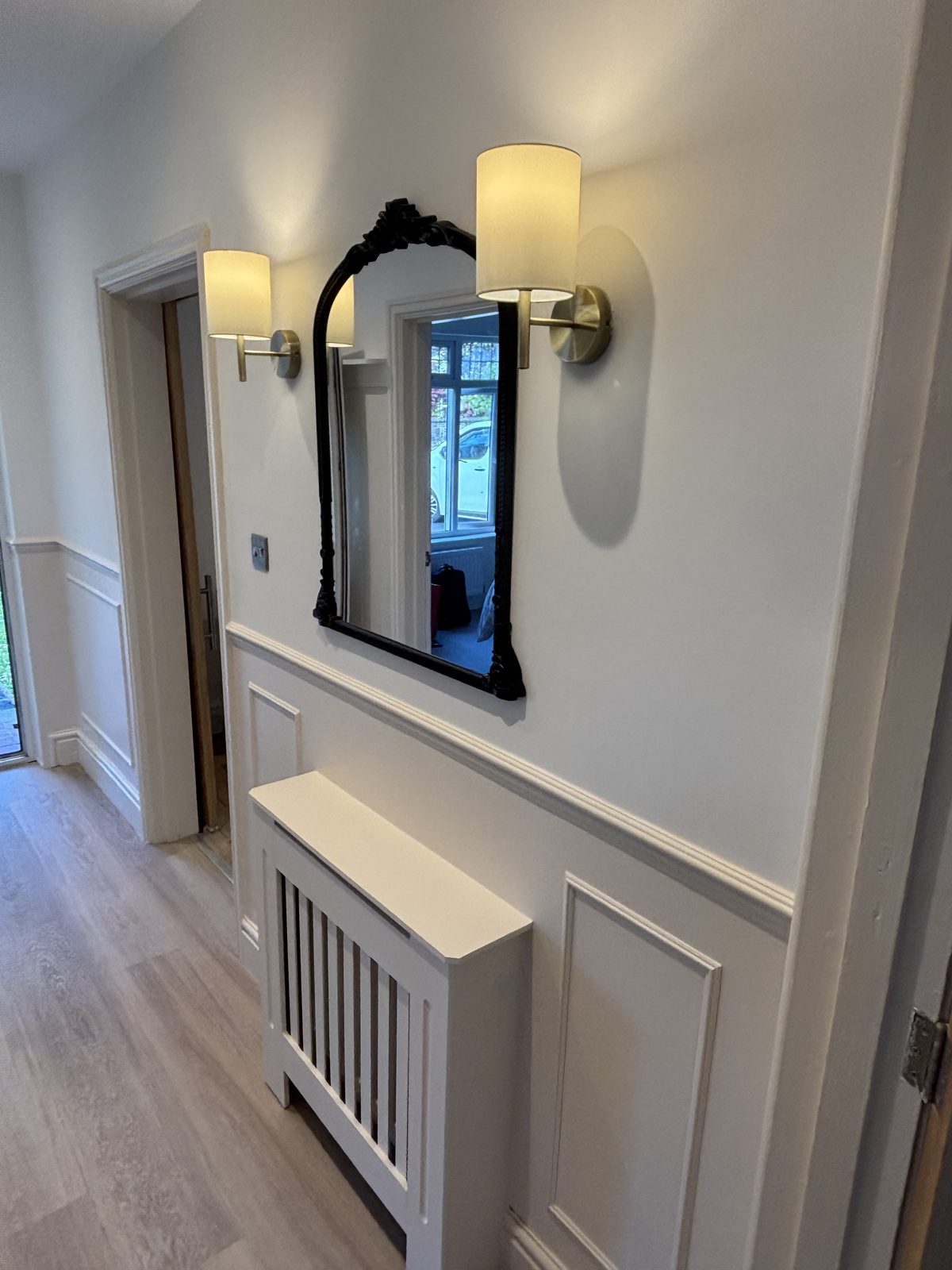 Hallway radiator cover and mirror, North Devon