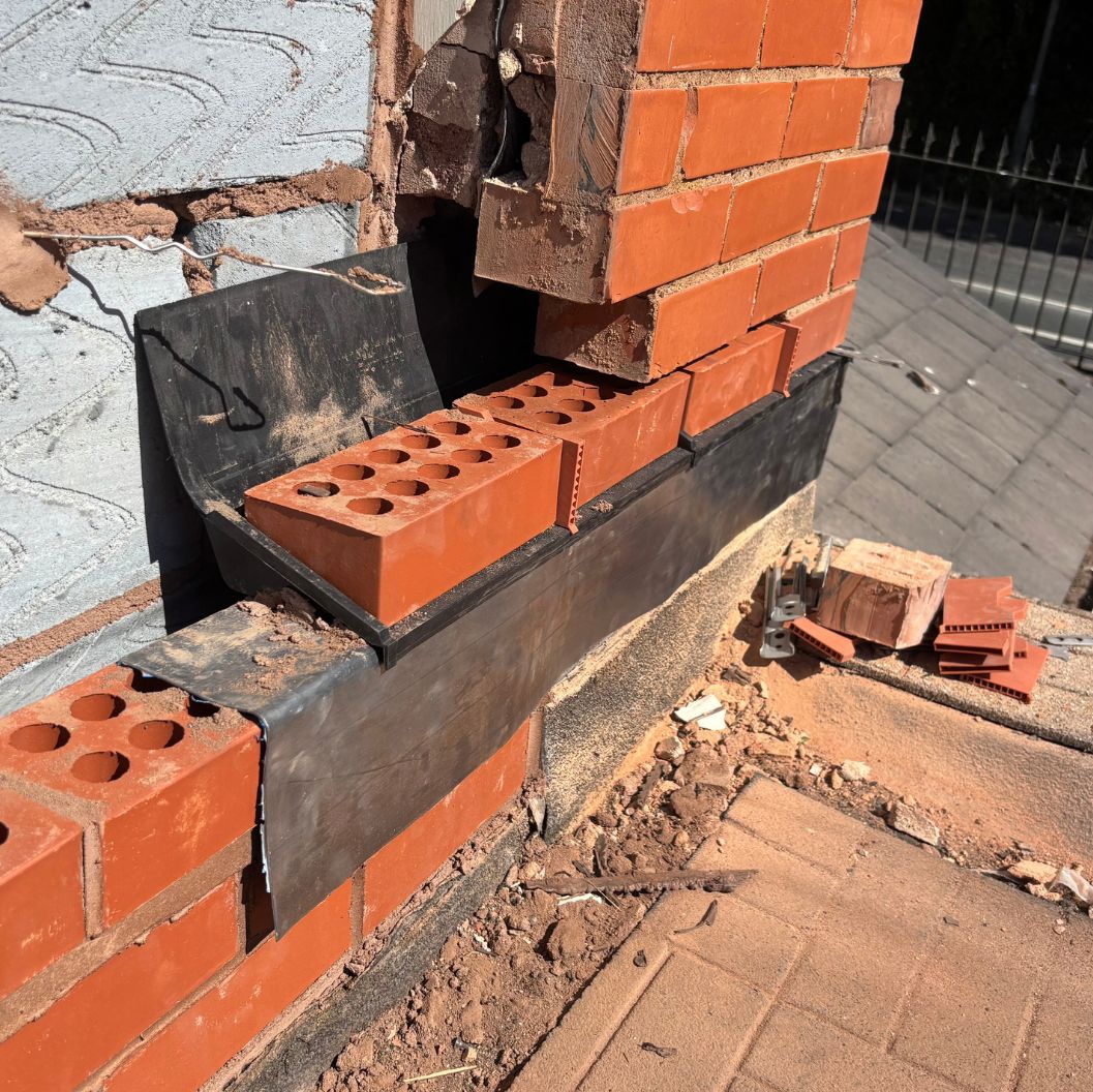 Blockwork and new cavity tray to a blocked up doorway