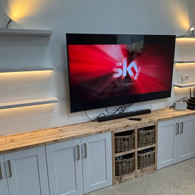Media wall with shelf lighting switched on
