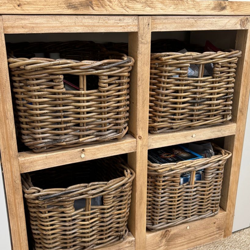 Timber stained basket frame with wicker baskets